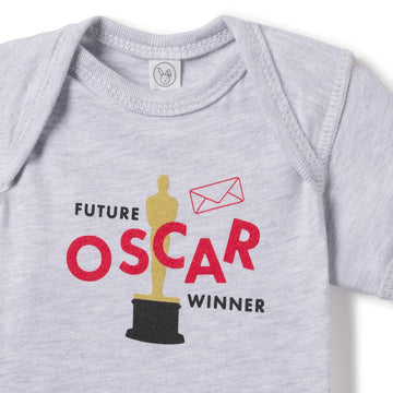 Gray baby onesie with 'Future Oscar Winner' text and graphic on a white background